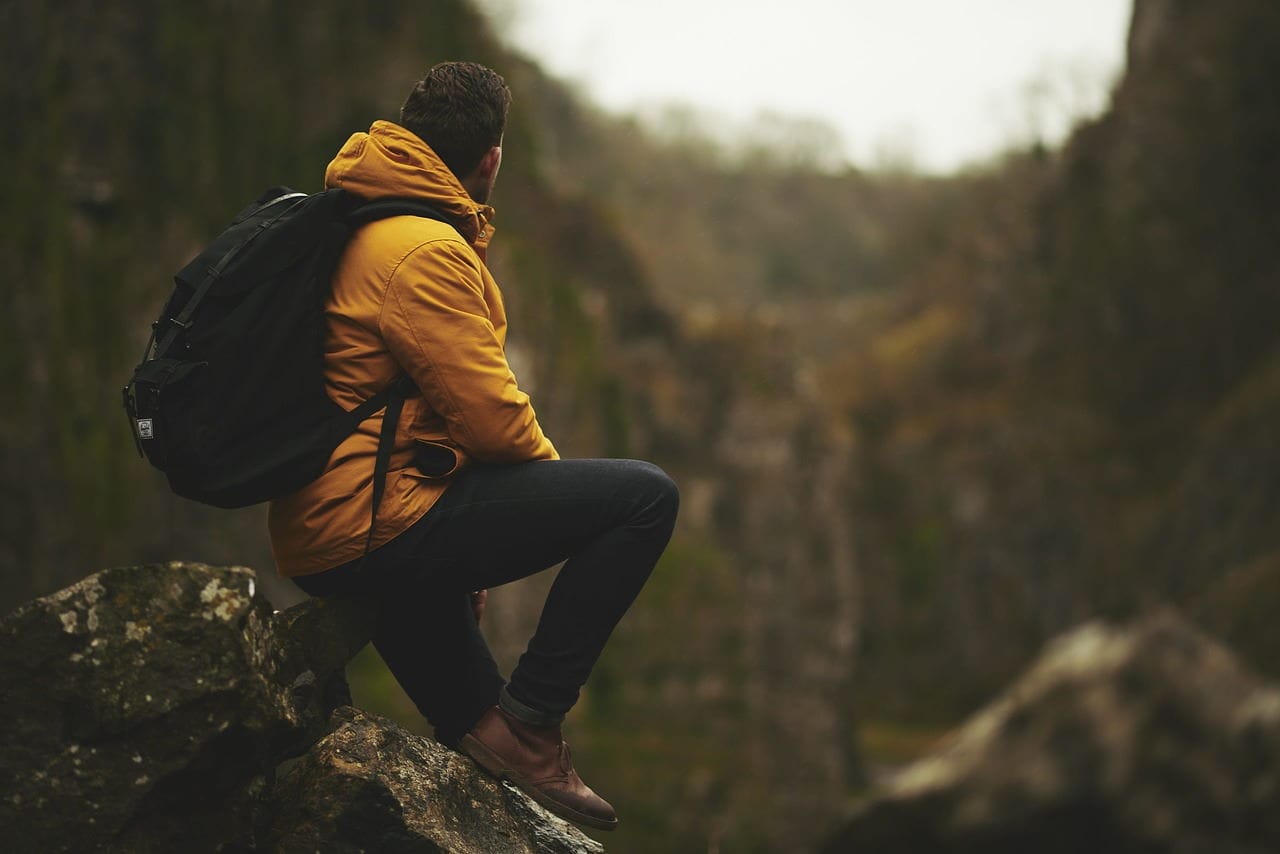 mountain hiker staring into the distance