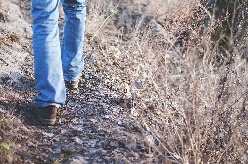 boots on gravely terrain