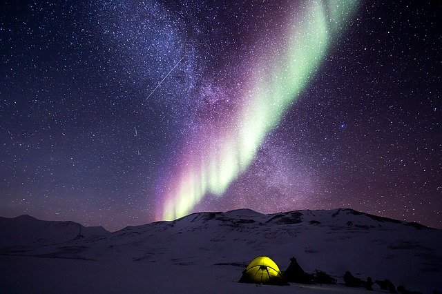 aurora borealis and tent