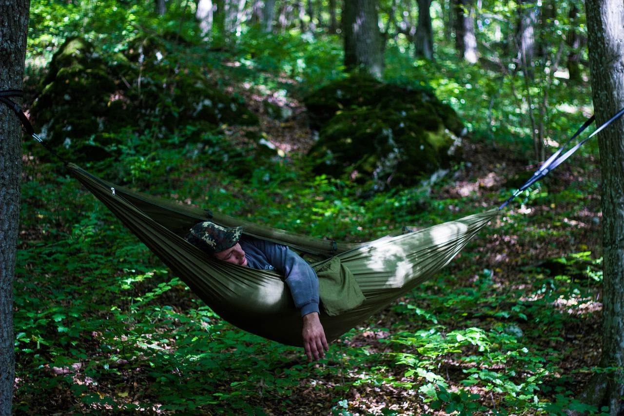 sleeping in a hammock