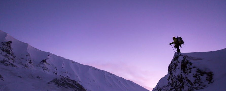 skier in a twilight sky