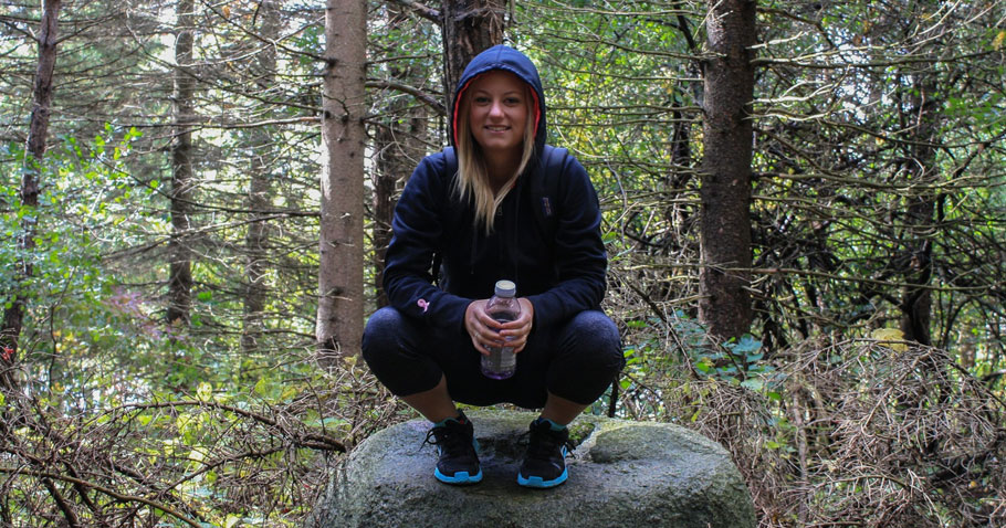 happy girl hiking in leggings